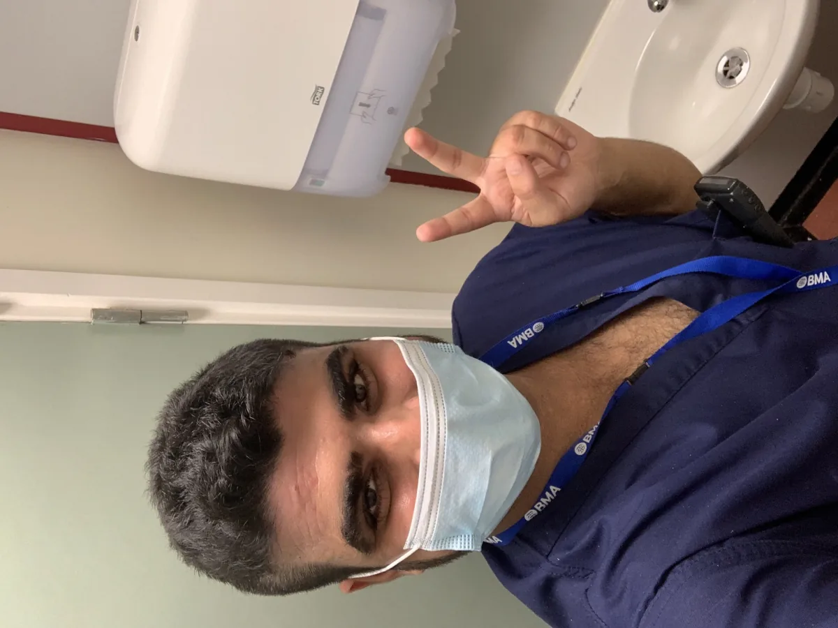 Dr Haroon Ahmad in scrubs at the hospital